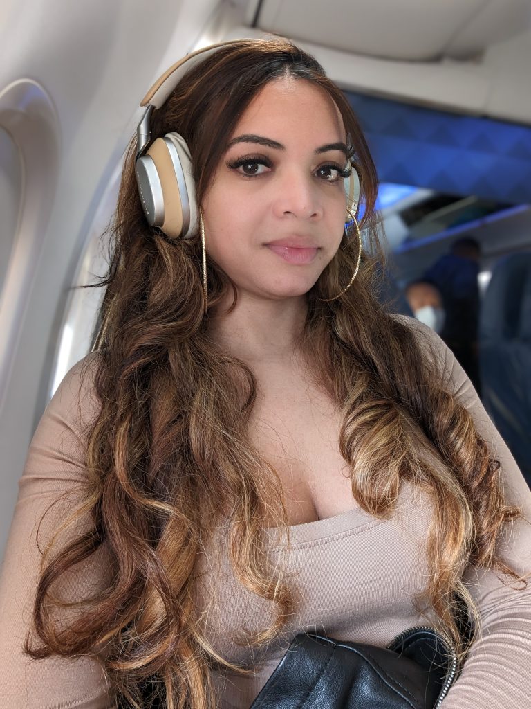 woman with long hair on a plane. 